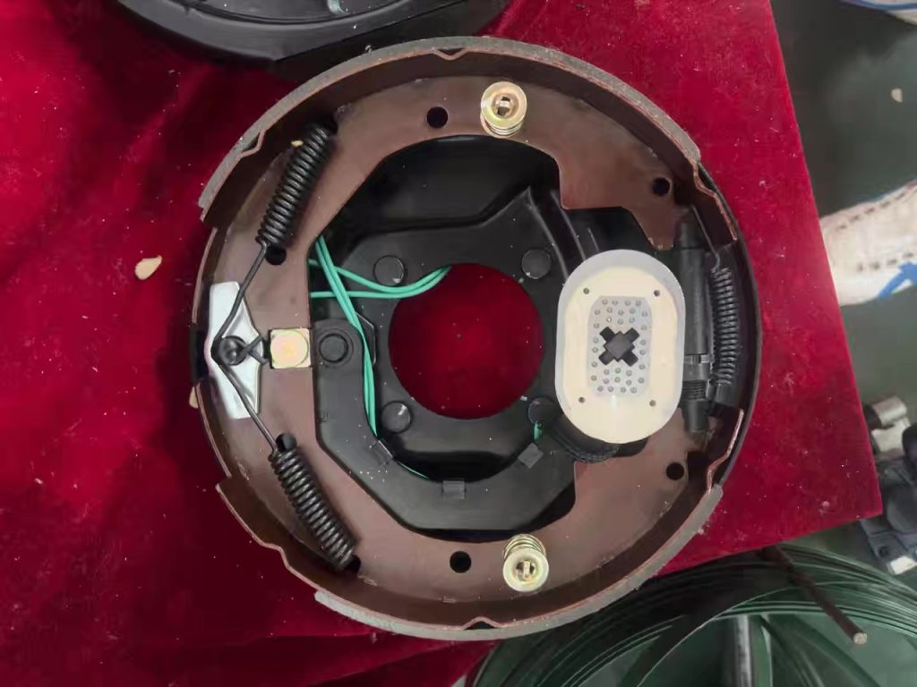 electric trailer brake assembly loaded backing plate front view