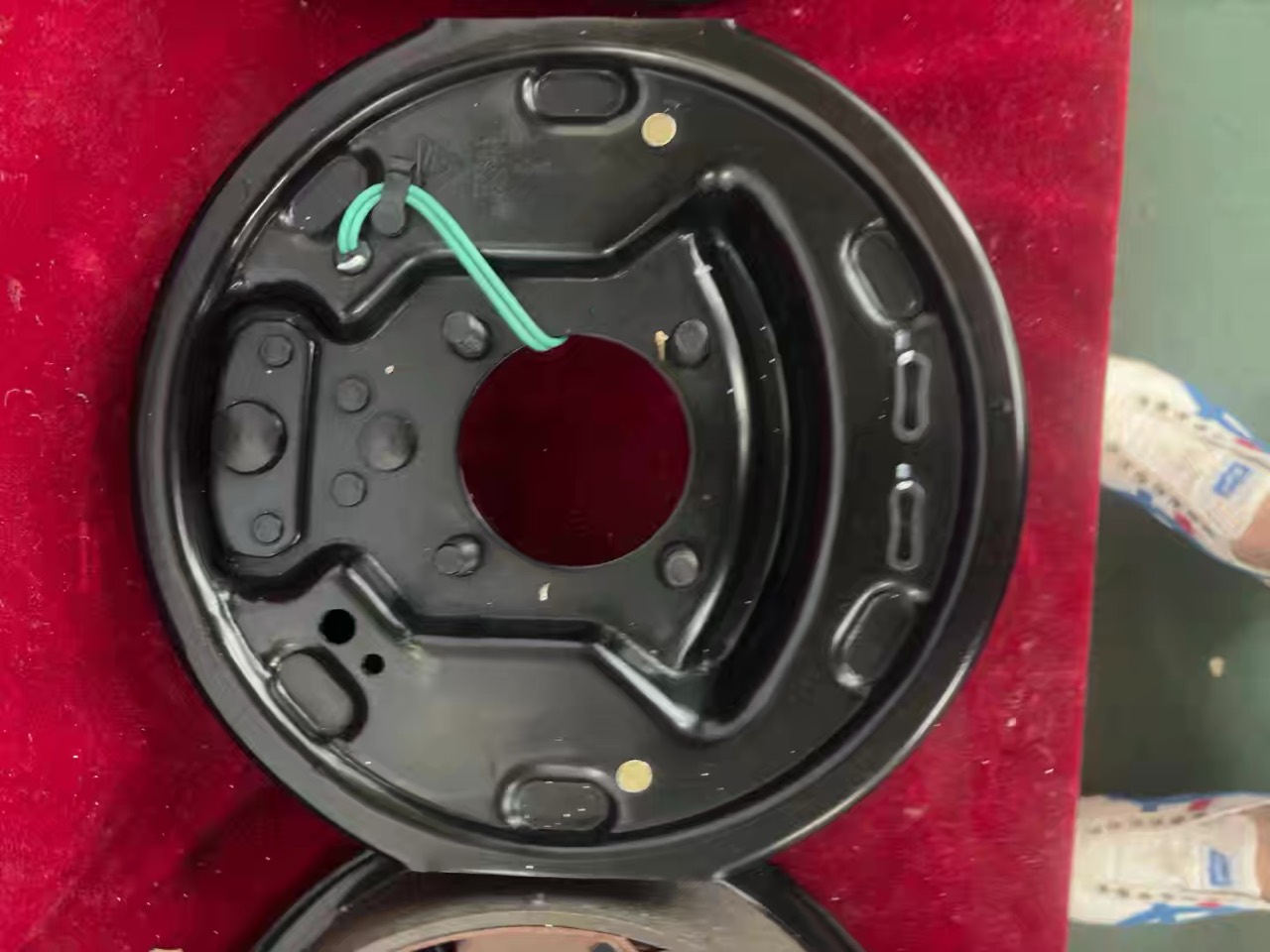 electric trailer brake backing plate rear view with wiring